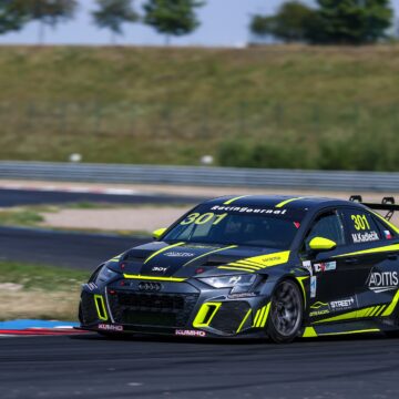 Martin Kadlečík passes Adam Kout to win Race 1 at Most