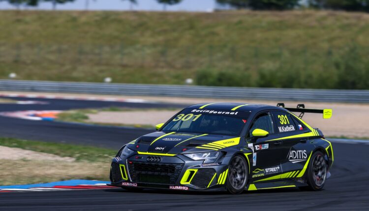 Martin Kadlečík passes Adam Kout to win Race 1 at Most
